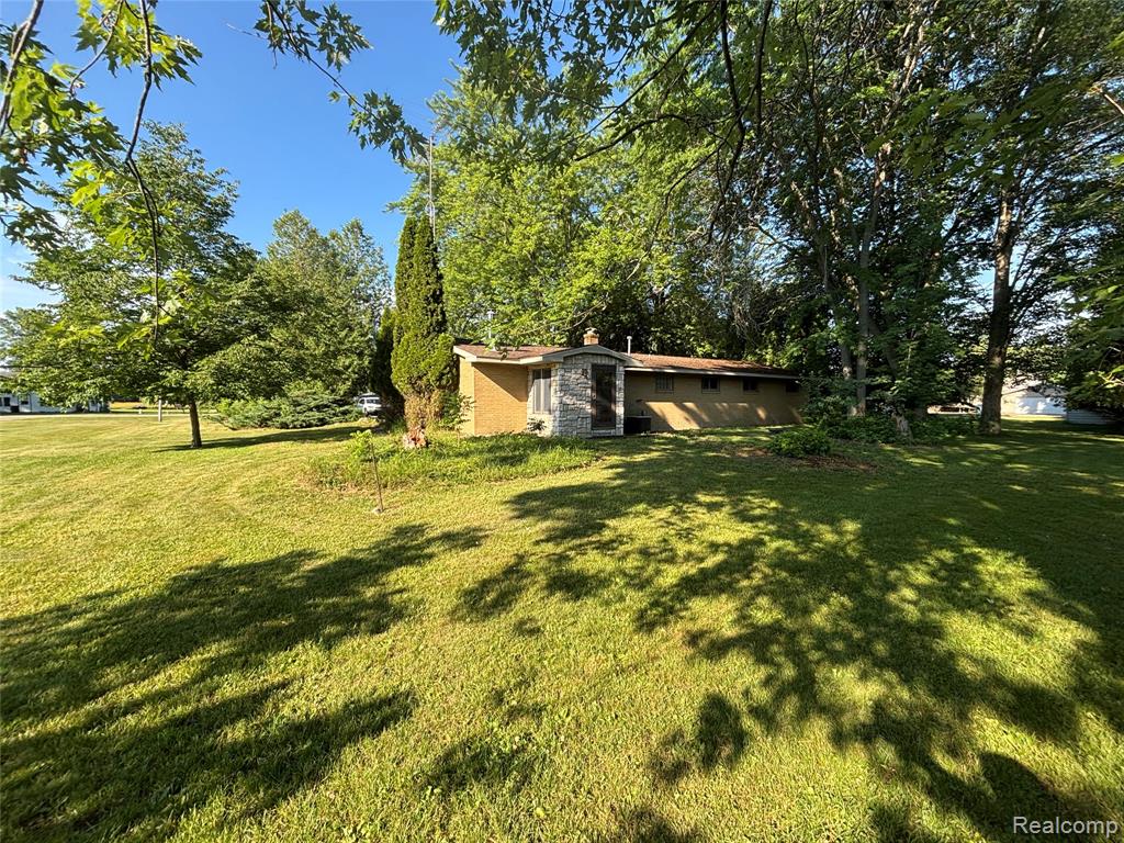 709 E Michigan Avenue E, Au Gres, MI 48703 — Photo 5