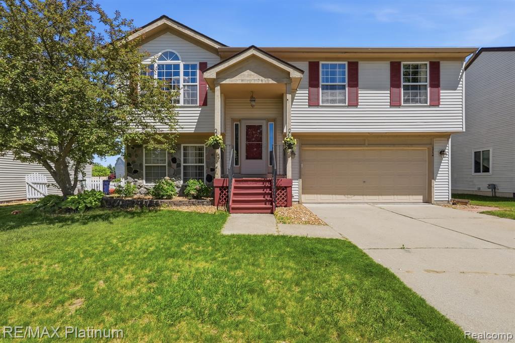1714 Newgate Lane, Howell, MI 48843 — front exterior