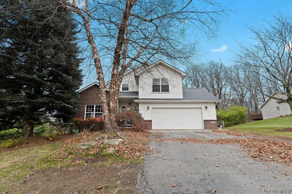 41 SUNSET PINES Drive, Howell, MI 48843 — front exterior