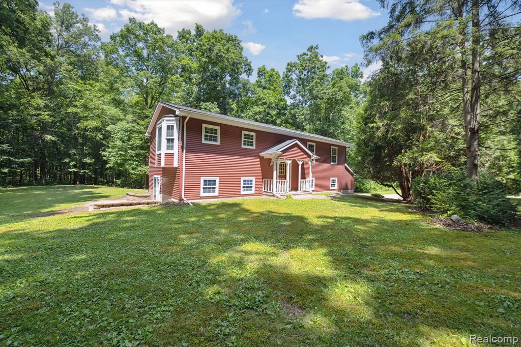 5849 Whispering Oaks Drive, Howell, MI 48855 — Photo 2