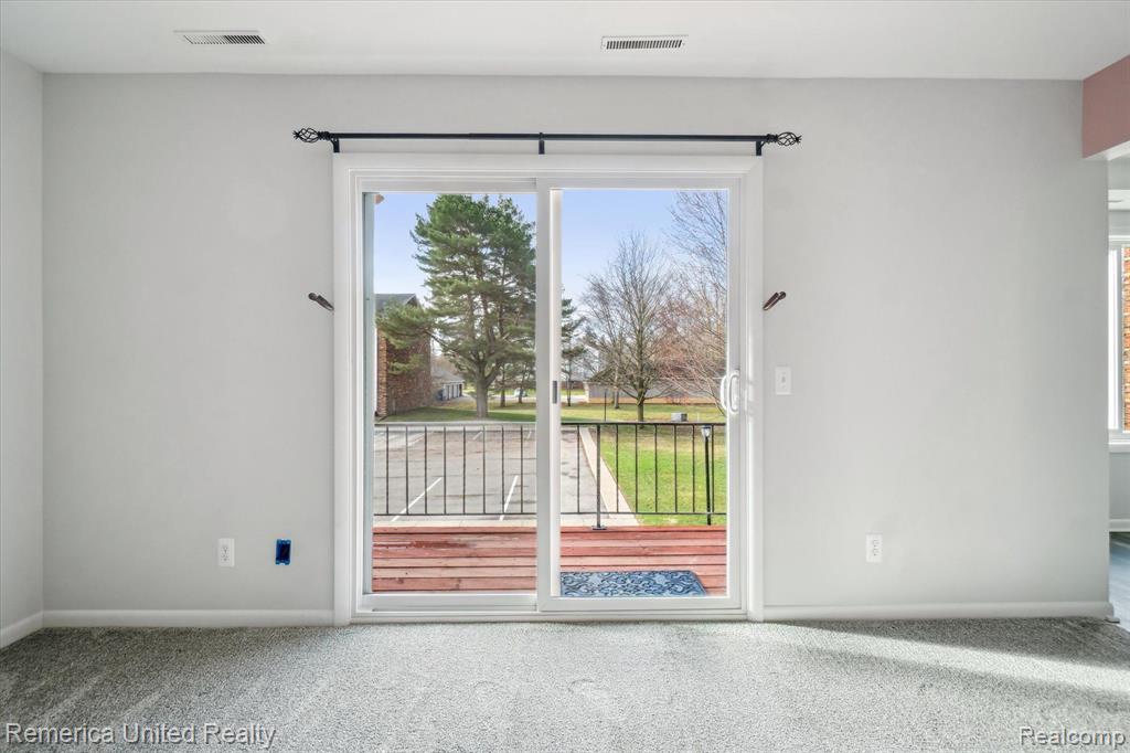 507 W HIGHLAND Road, D-9, Howell, MI 48843 — Photo 23