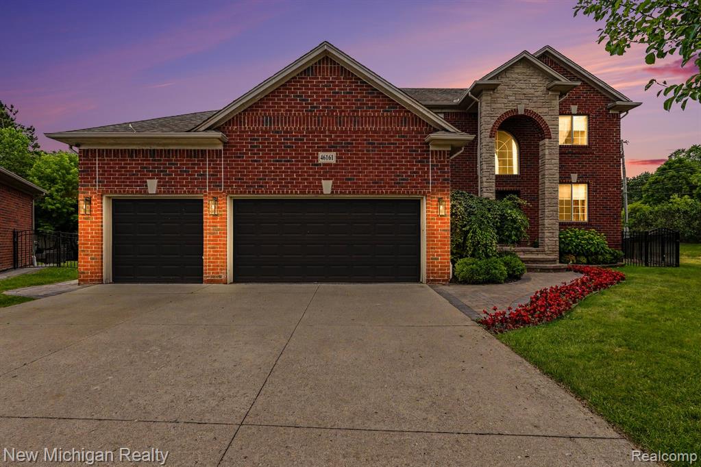46161 S Manitou Court, Utica, MI 48317 — front exterior