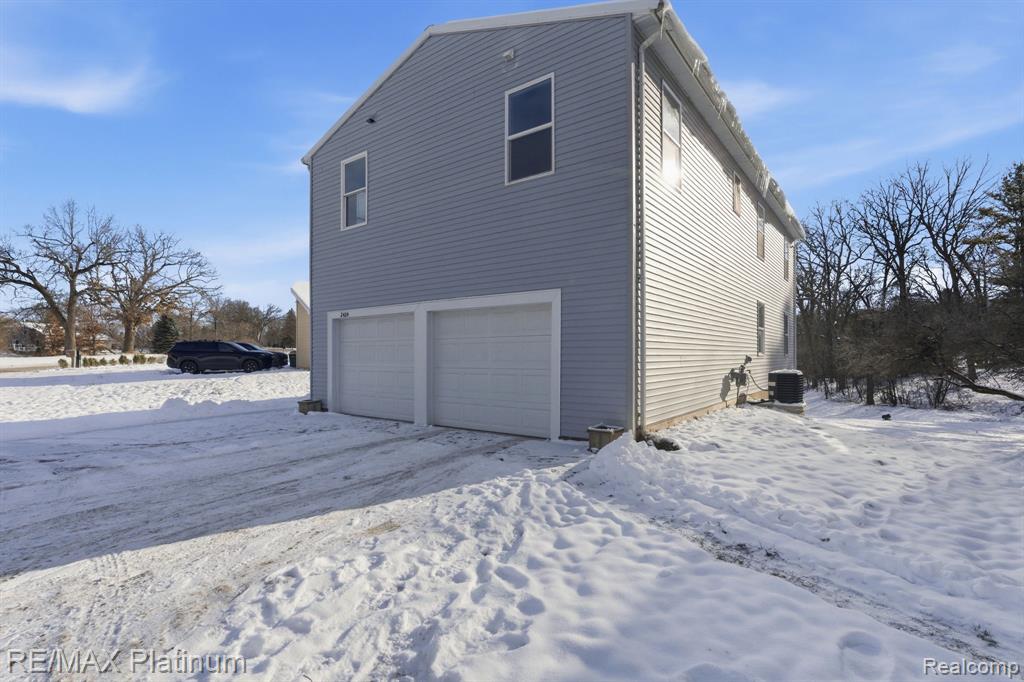 2424 Fisher Road, Howell, MI 48855 — front exterior