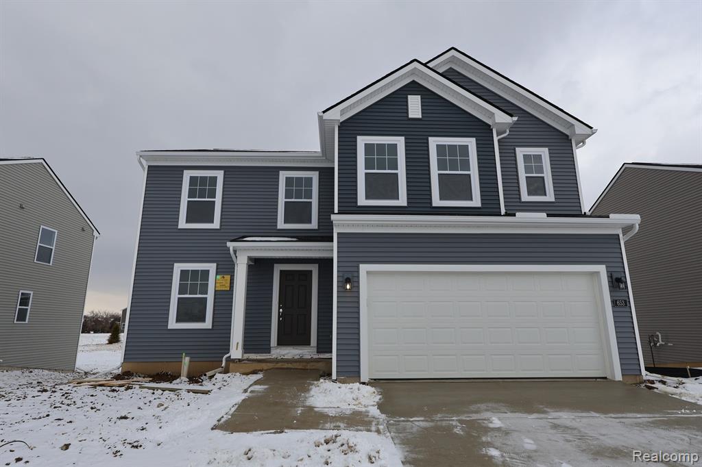 653 Swift Creek Drive, Chelsea, MI 48118 — front exterior