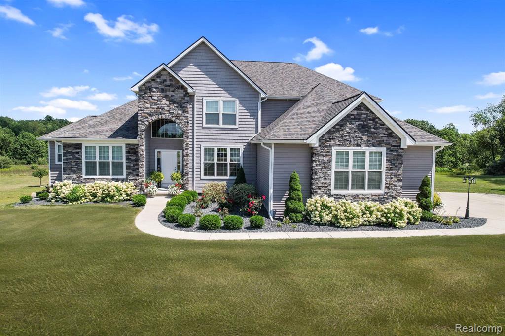 5348 Stone Garden Drive, Howell, MI 48843 — front exterior