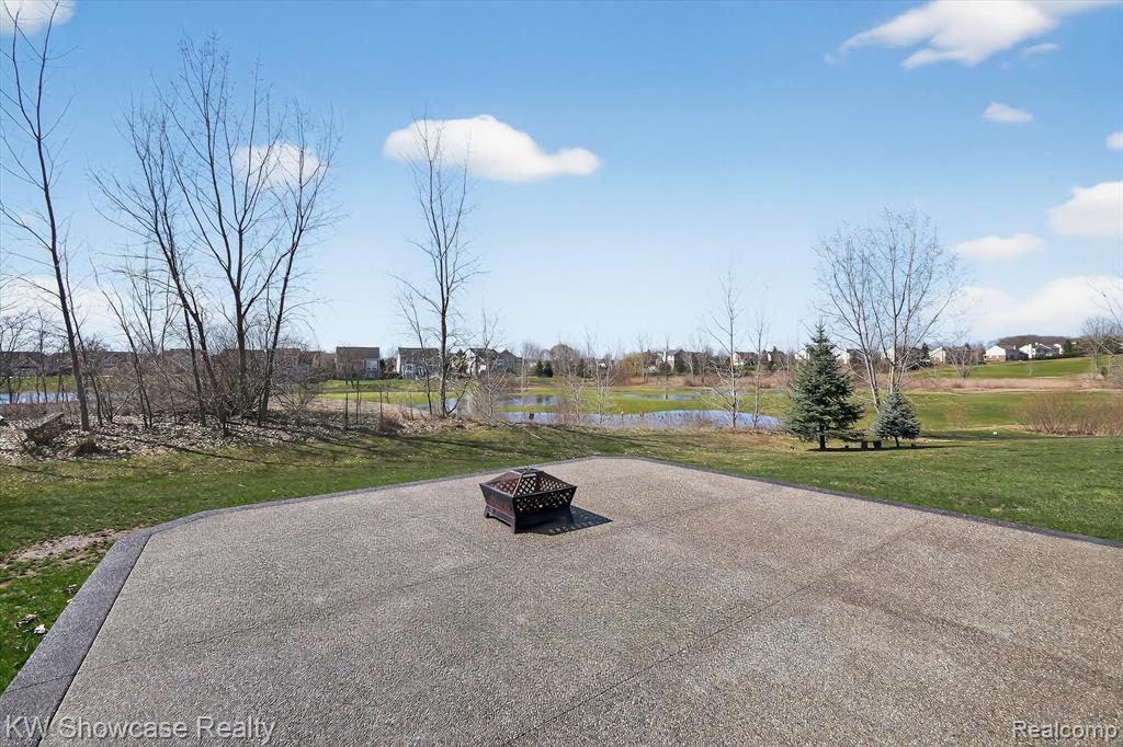 View of patio featuring a fire pit