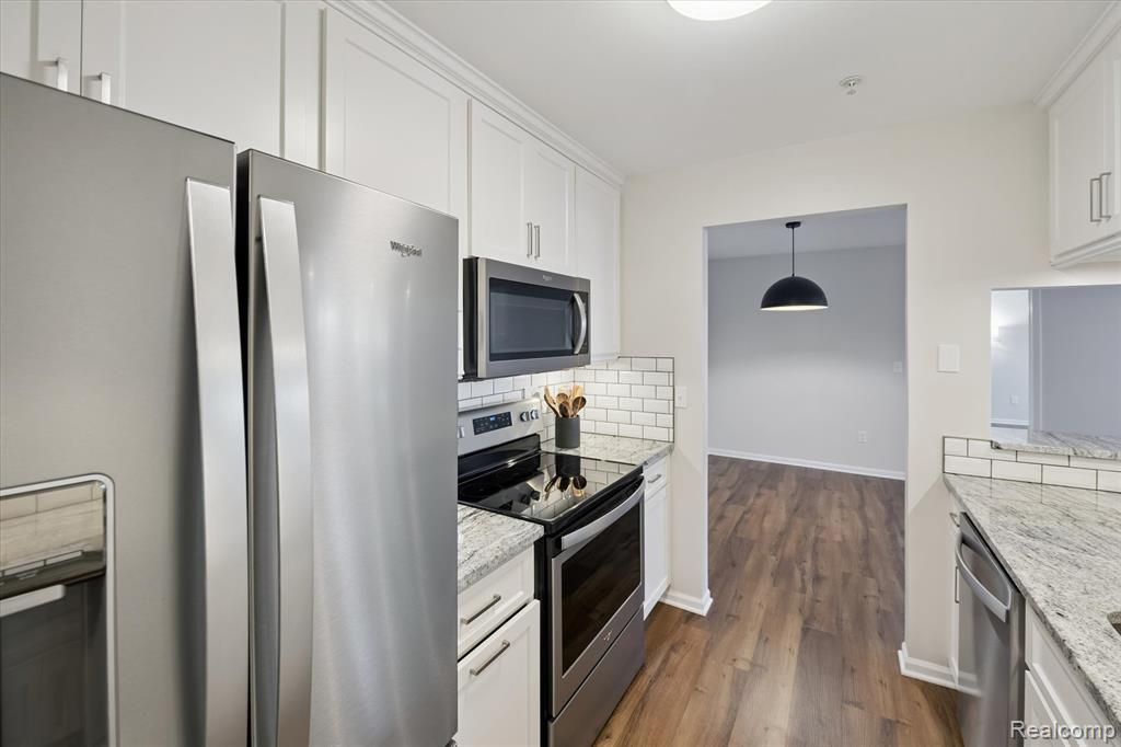 28256 Oakmonte Circle E, New Hudson, MI 48165 — Photo 16