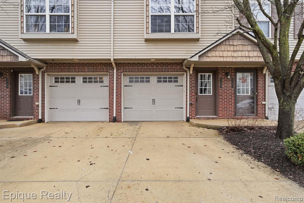 2206 Knotty Pine Trail, Howell, MI 48855 — front exterior