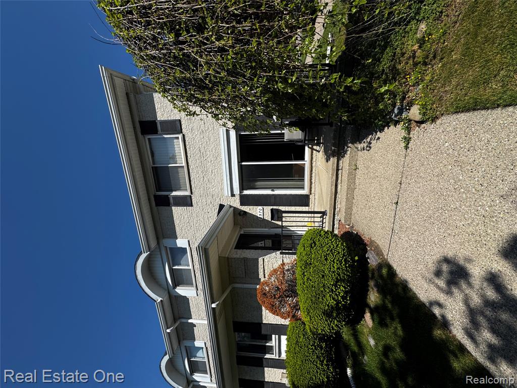 8570 Hampshire Drive, Sterling Heights, MI 48313 — front exterior