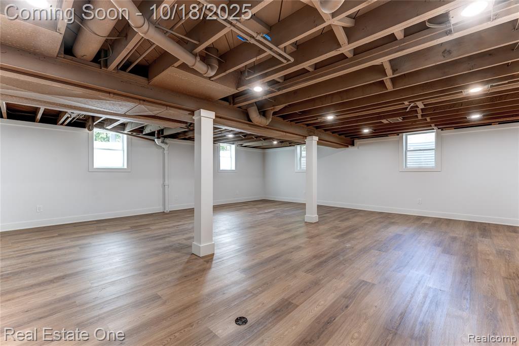 Below grade area with light wood finished floors
