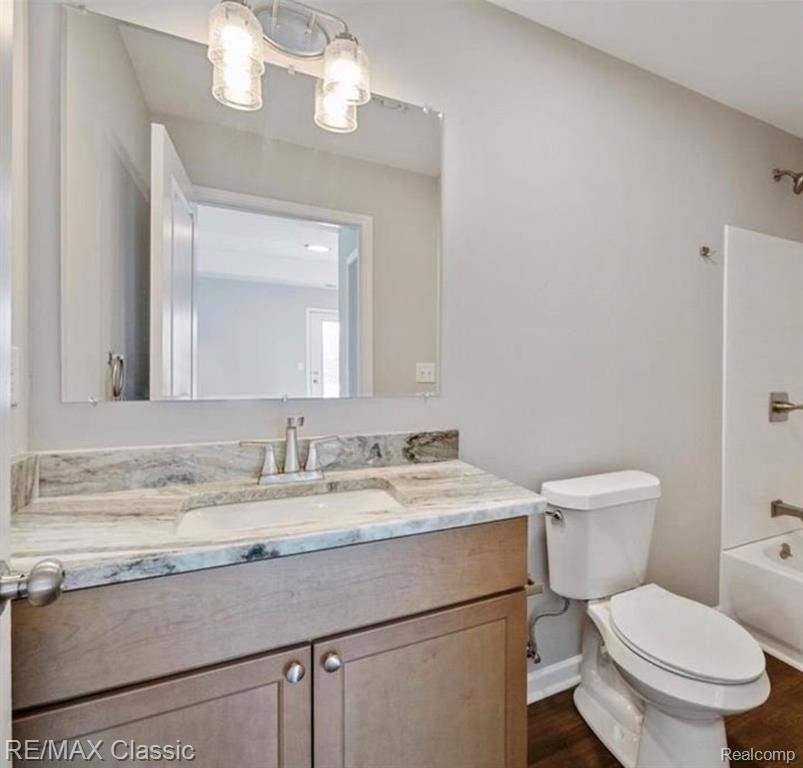 612 Pointe Drive, Walled Lake, MI 48390 — Photo 17