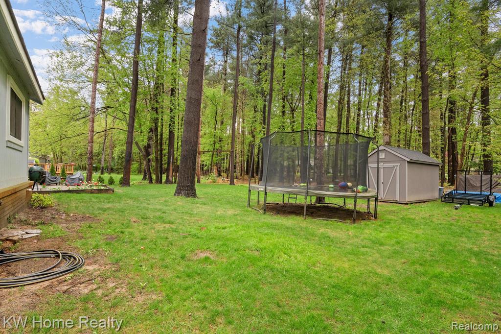 4143 EMERALD PINES Drive, Commerce Twp, MI 48390 — Photo 54
