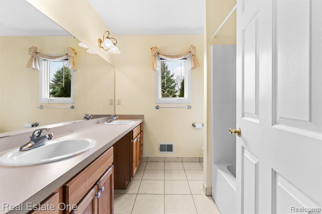 9305 Rotondo Drive, Howell, MI 48855 — Photo 22