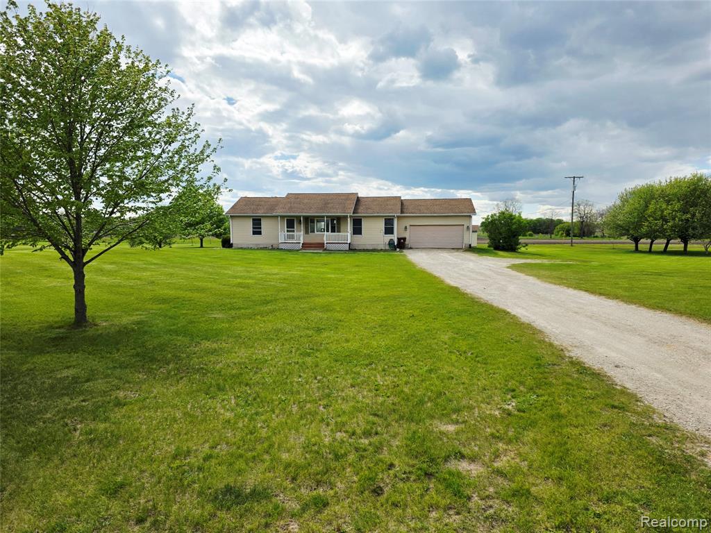 10423 Fowlerville Road, Fowlerville, MI 48836 — front exterior