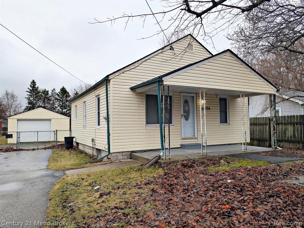 2074 N Center Road, Burton, MI 48509 — front exterior
