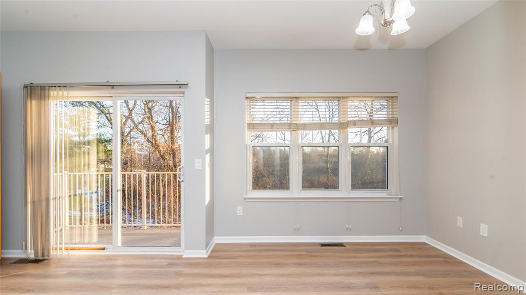 6114 Heron Hills Drive, Wolverine Lake, MI 48390 — Photo 14
