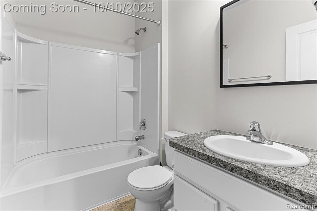 57797 Village Drive, New Hudson, MI 48165 — Photo 21