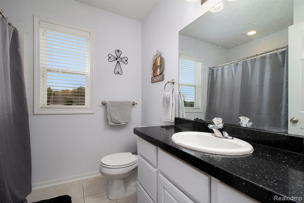 703 N Hughes Road, Howell, MI 48843 — Photo 18