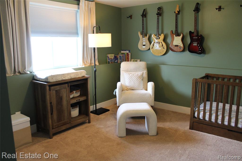 8662 Pinnebog River Drive, Fowlerville, MI 48836 — Photo 20