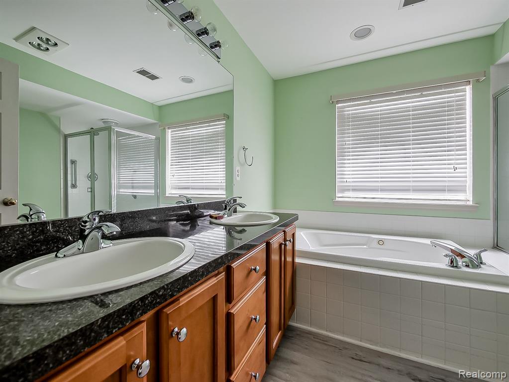 628 RIVERSTONE Lane, Chelsea, MI 48118 — Photo 16