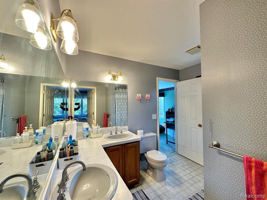 989 ELMSMERE Drive, Northville, MI 48167 — Photo 27