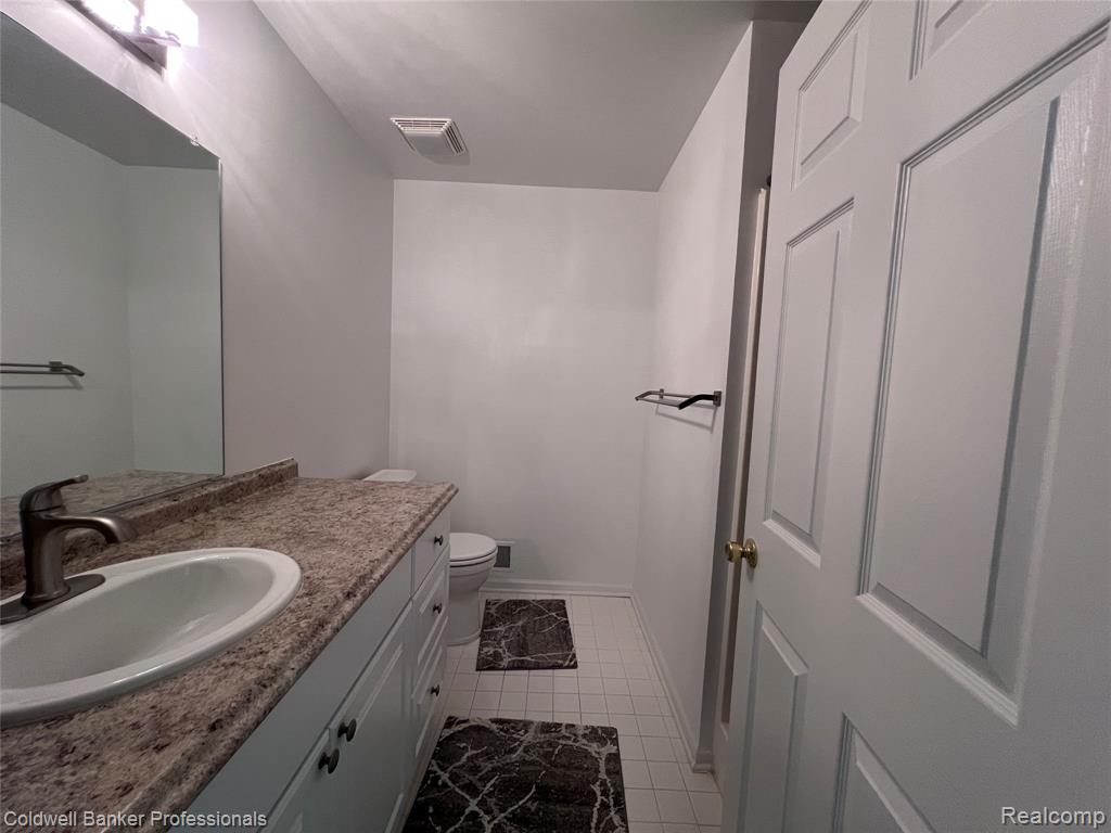 654 Chestnut Drive, Wixom, MI 48393 — Photo 16