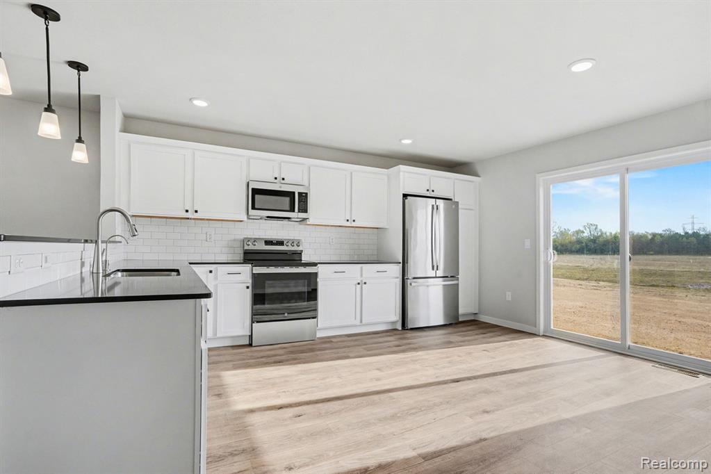 3157 Wild Orchid Lane, Burton, MI 48519 — Photo 6