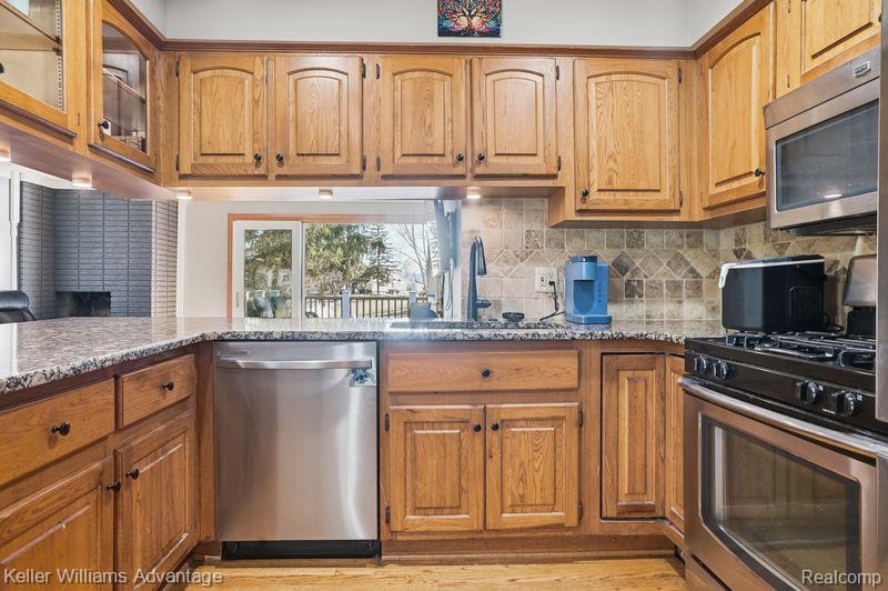 1210 Craven Drive, Highland, MI 48356 — Photo 16