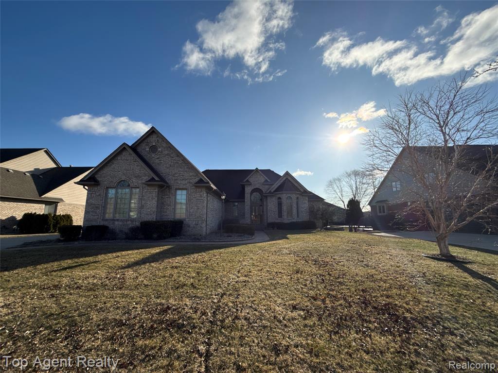 57584 Apple Creek Drive, Washington, MI — front exterior