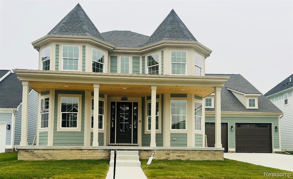 54630 Brenda Drive, Macomb, MI 48042 — front exterior