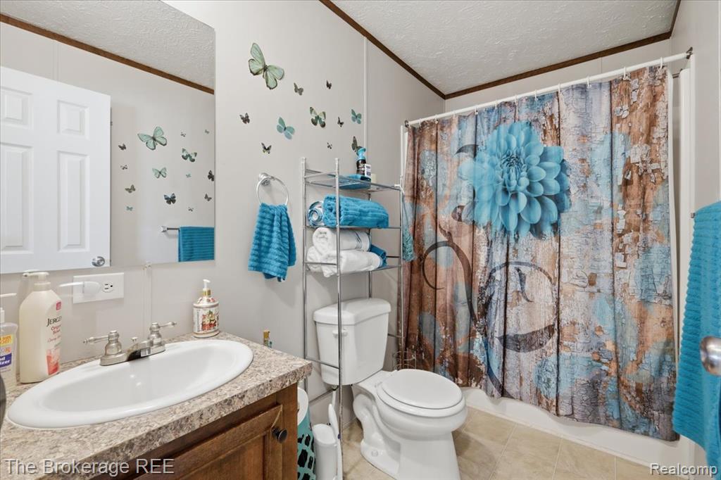 9542 Foxwell Circle, Fenton, MI 48430 — Photo 22