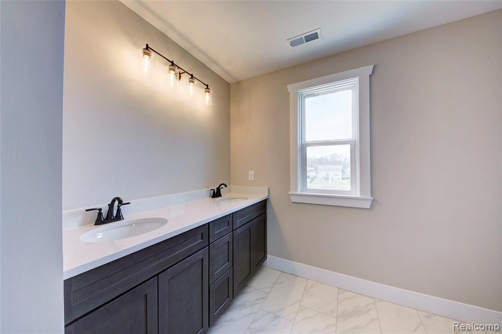 664 ROUND ROCK, Howell, MI 48843 — Photo 15