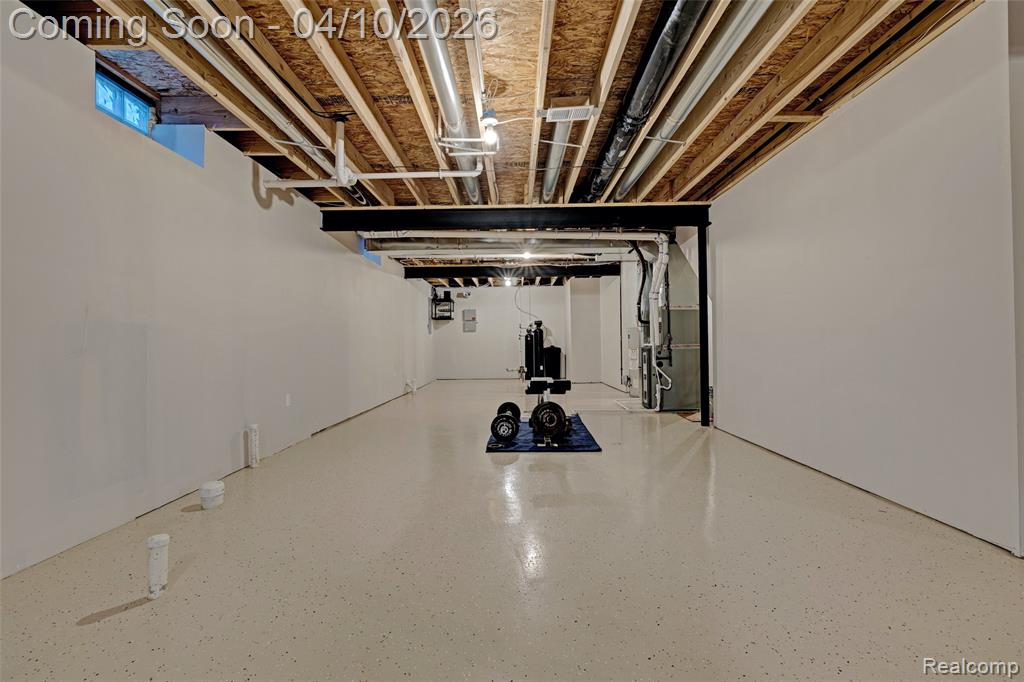 Unfinished basement with heating unit