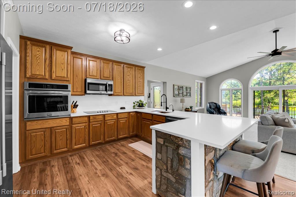 9438 Deer Creek Court, Brighton, MI 48114 — Photo 13