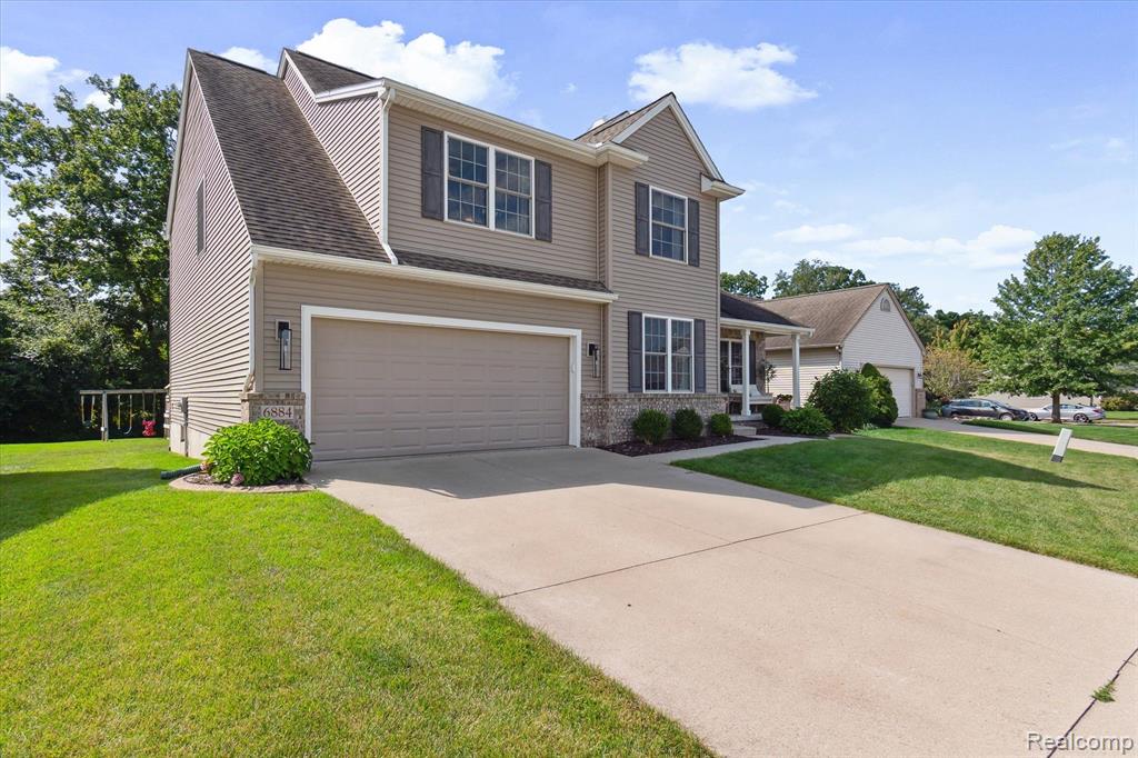 6884 WELLINGTON Drive, Dexter, MI 48130 — Photo 2