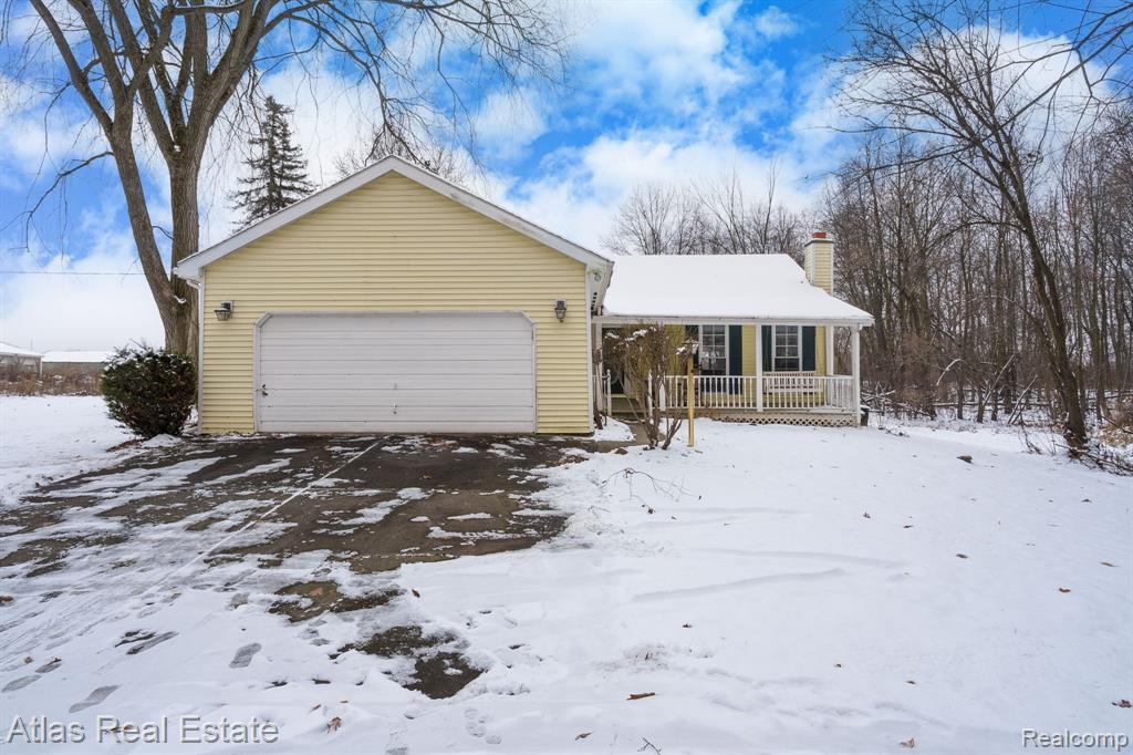 11396 Hill Road, Goodrich Vlg, MI — front exterior