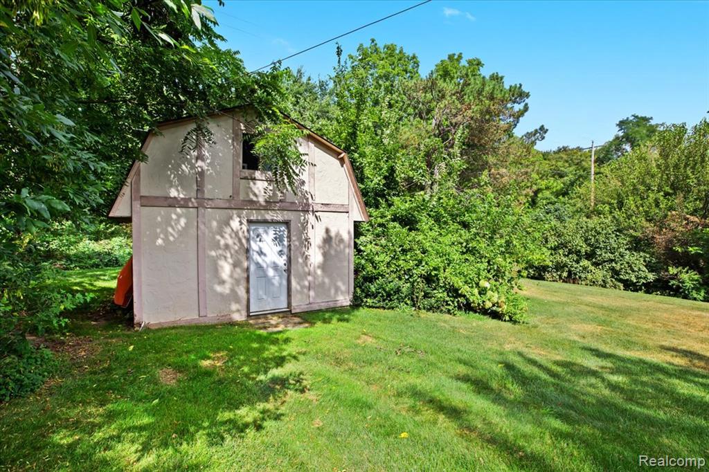 60023 Trailwood Street, Washington, MI — Photo 38