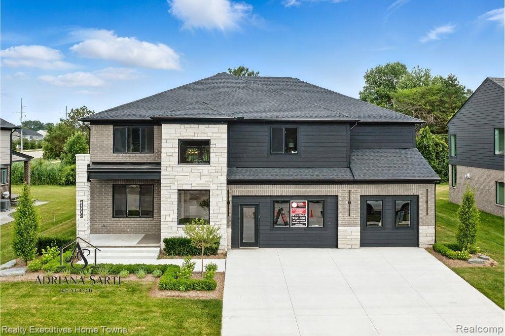 50931 MISTWOOD Drive, Macomb, MI 48042 — front exterior