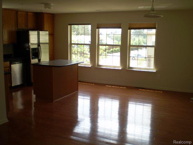 410 BOARDWALK Drive, Walled Lake, MI 48390 — Photo 2