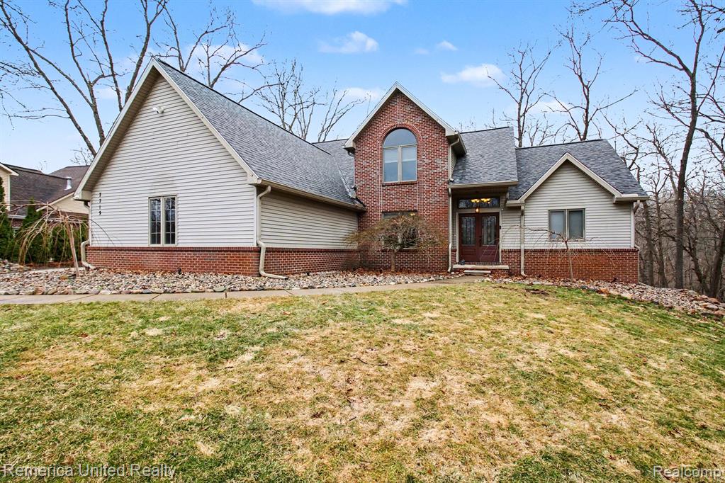 7719 PARTRIDGE HILL Drive, Brighton, MI 48116 — front exterior