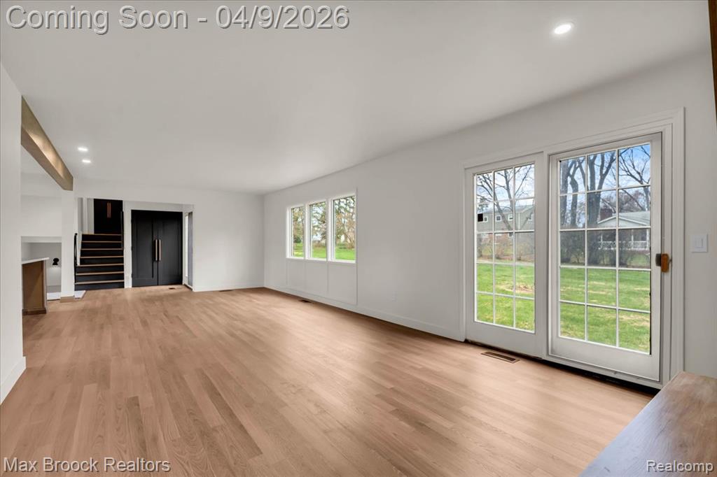 Unfurnished living room featuring recessed lighting and light wood finished floors