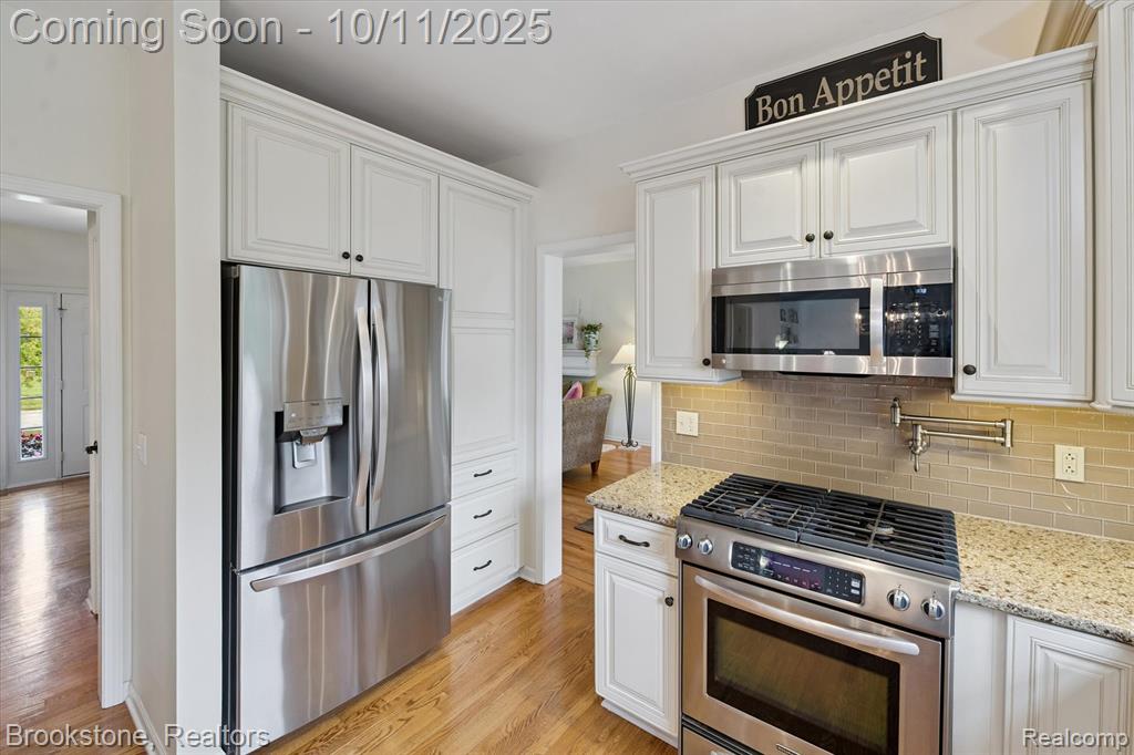 9079 Woodgrove Drive, Plymouth, MI 48170 — Photo 19