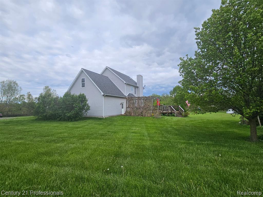 1451 ASHLYN Court, Fowlerville, MI 48836 — Photo 16