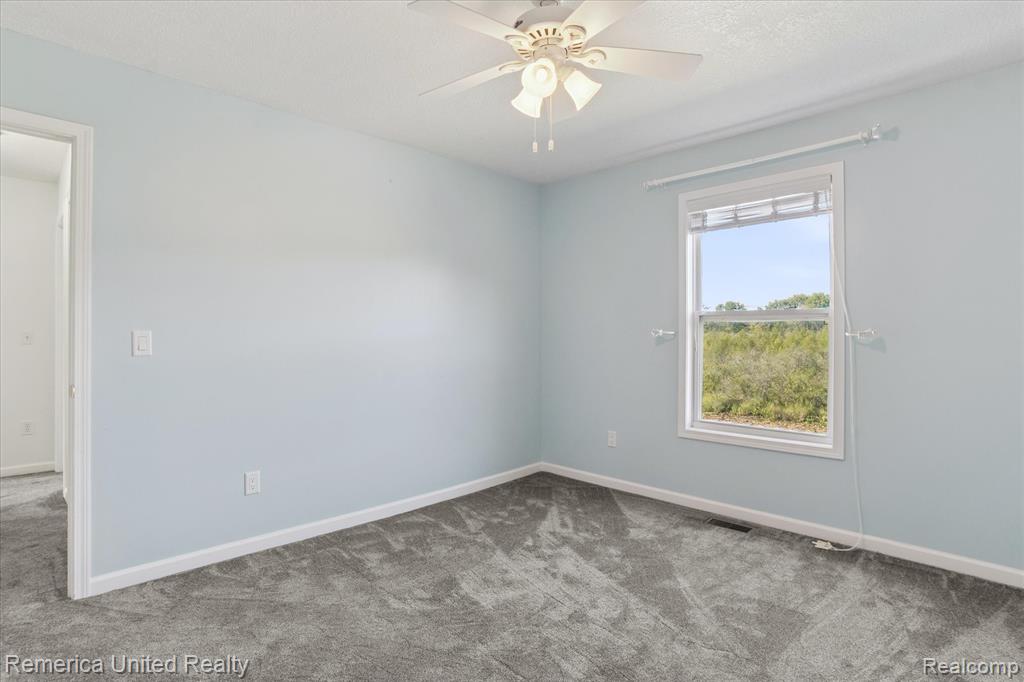 8474 Baudine Road, Pinckney, MI 48169 — Photo 24