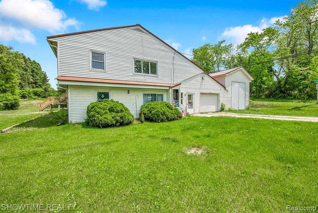 654 N BLACKS CORNERS Road, Imlay City, MI 48444 — front exterior