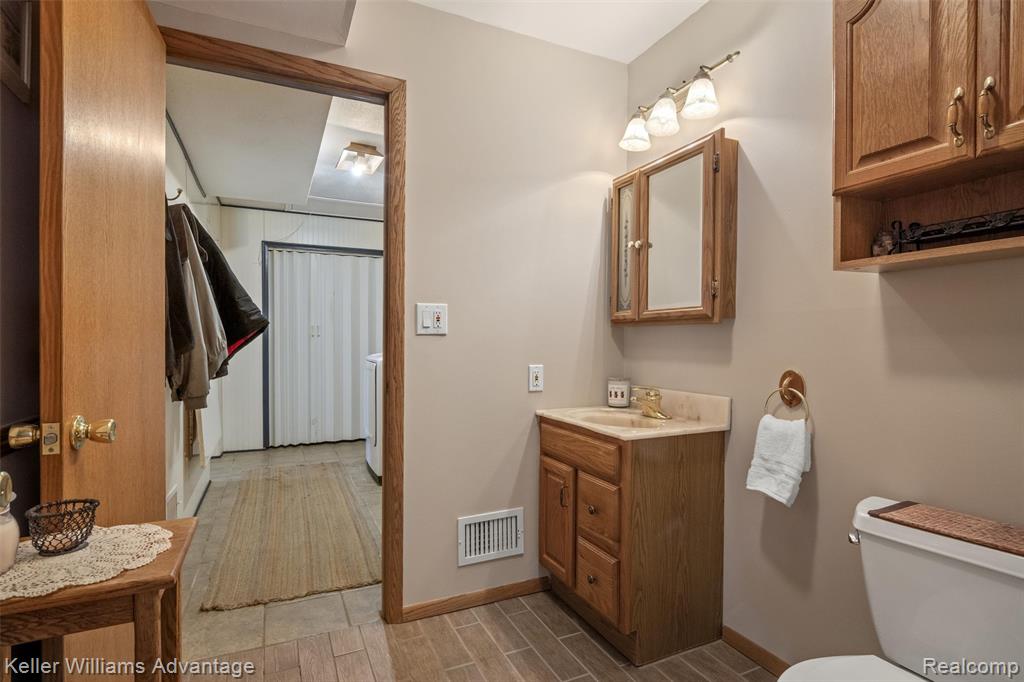 340 Angola Street, Wolverine Lake, MI 48390 — Photo 35