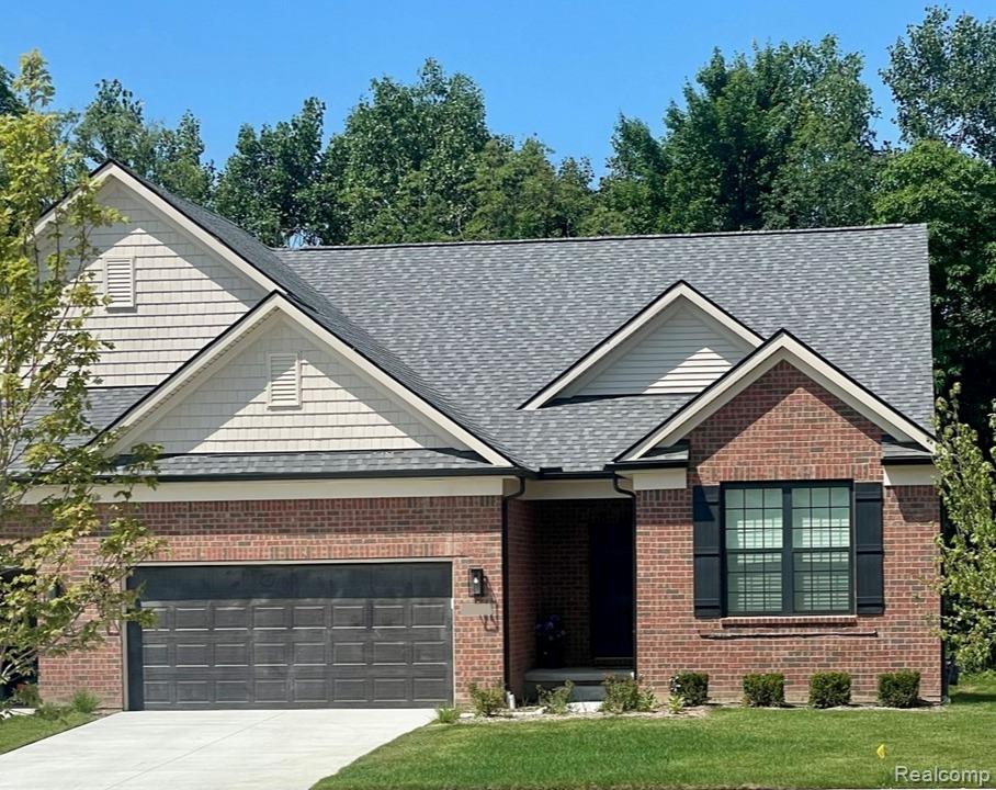 55762 Oak Pointe Drive, Shelby Twp, MI 48315 — front exterior
