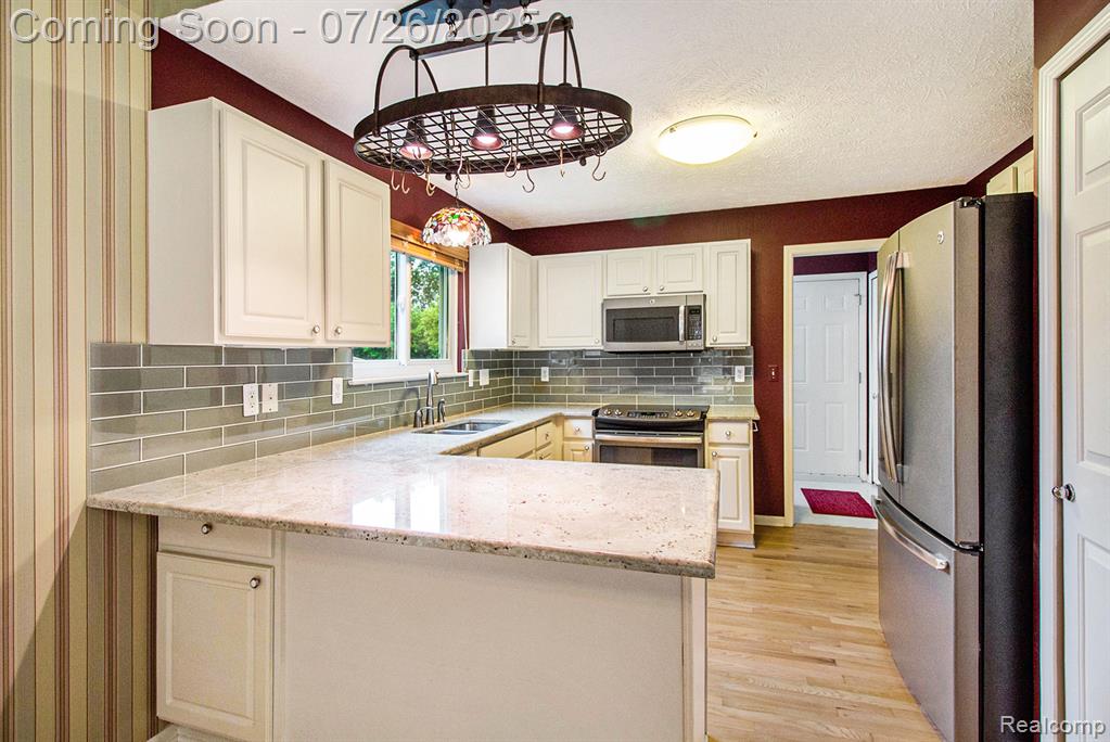 1051 Spirea, Howell, MI 48843 — Photo 12
