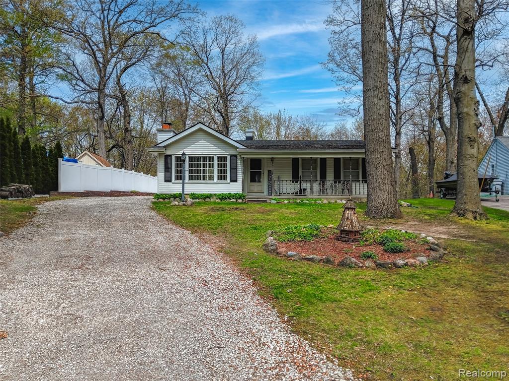 11849 Four Lakes Drive, South Lyon, MI 48178 — front exterior
