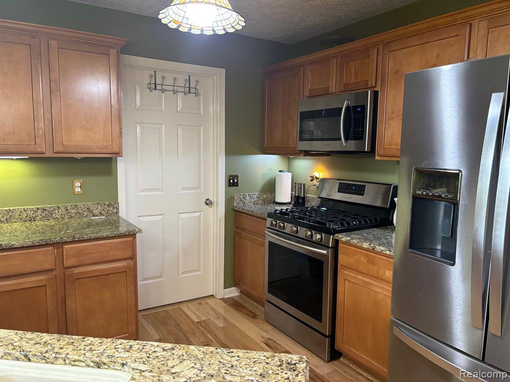 867 SPIREA, Unit #89, Howell, MI 48843 — Photo 5